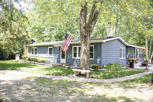 108 Poplar St, Mchenry, IL 60051 - view of front of property with a chimney and a front lawn