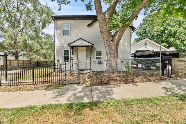 305 Irving St, Joliet, IL 60432 - traditional-style house featuring a fenced front yard