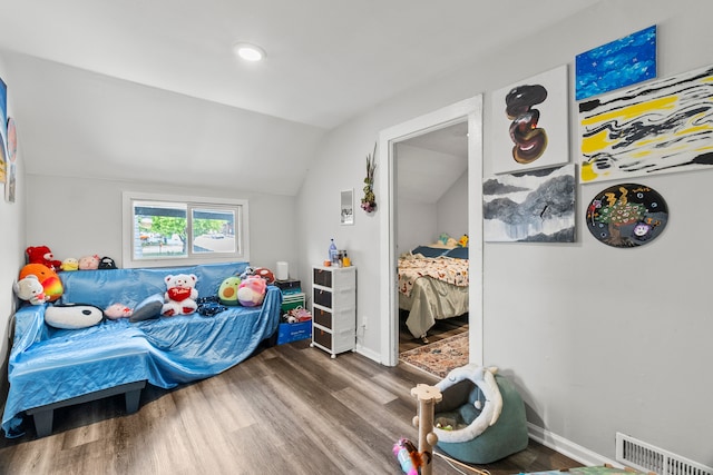 305 Irving St, Joliet, IL 60432 - bedroom with vaulted ceiling and wood finished floors