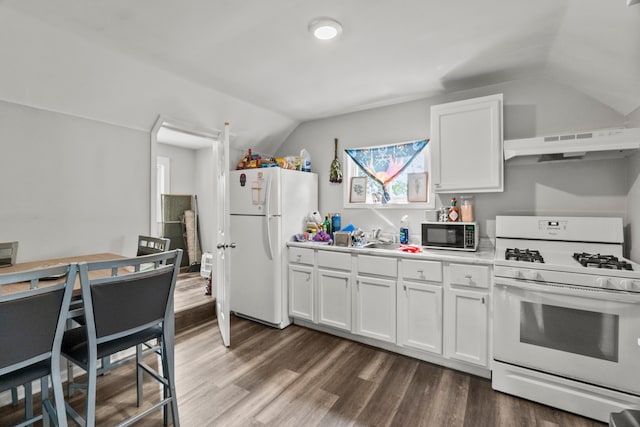 305 Irving St, Joliet, IL 60432 - kitchen with white appliances, under cabinet range hood, lofted ceiling, white cabinetry, and light countertops