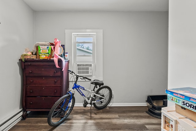 305 Irving St, Joliet, IL 60432 - misc room with a baseboard radiator, wood finished floors, and cooling unit