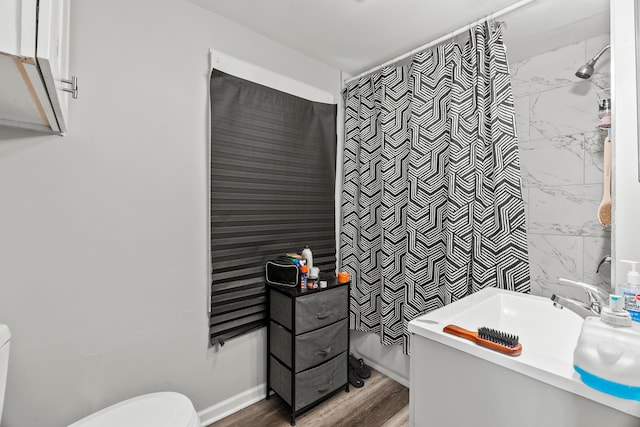305 Irving St, Joliet, IL 60432 - full bathroom with a shower, vanity, and wood finished floors