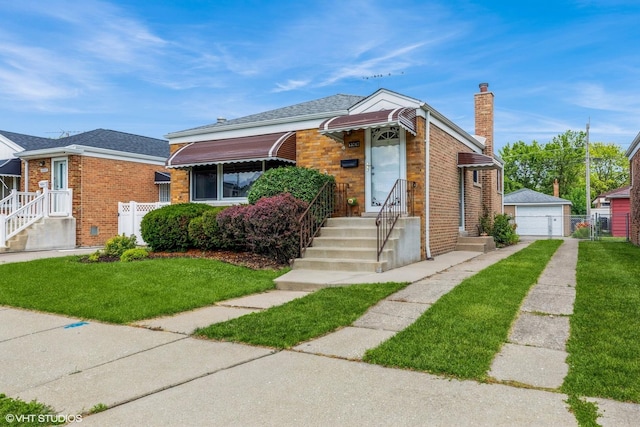 13247 S S Ave M, Chicago, IL 60633 - bungalow-style house with brick siding, a chimney, a detached garage, and entry steps