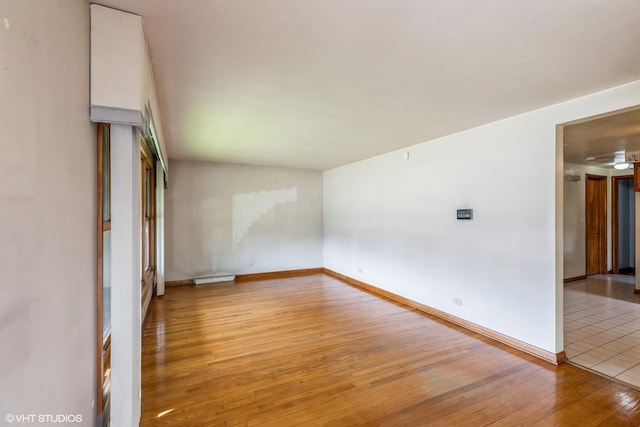 13247 S S Ave M, Chicago, IL 60633 - empty room featuring light wood-style flooring and baseboards