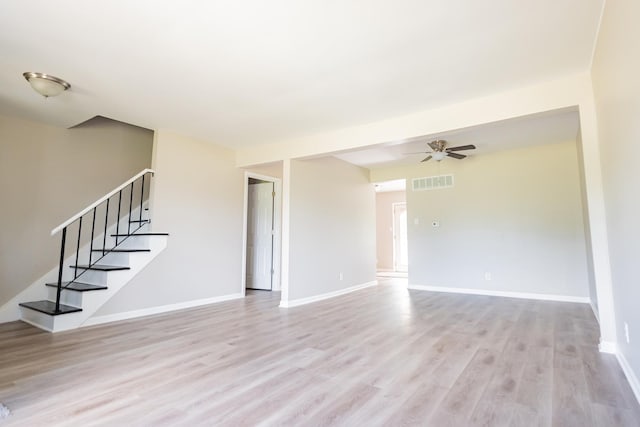 447 Yorkshire Sq, Bolingbrook, IL 60440 - unfurnished living room with stairway, light wood finished floors, and ceiling fan