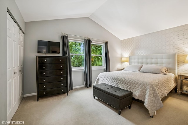 930 Bristol Trail Rd, Lake Zurich, IL 60047 - carpeted bedroom featuring vaulted ceiling, a closet, wallpapered walls, and an accent wall
