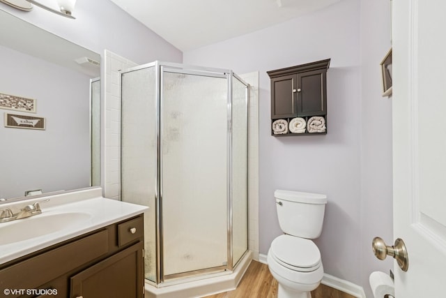 930 Bristol Trail Rd, Lake Zurich, IL 60047 - full bathroom featuring vanity, a stall shower, and wood finished floors