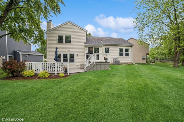 930 Bristol Trail Rd, Lake Zurich, IL 60047 - rear view of property with a chimney, a wooden deck, a lawn, and roof with shingles