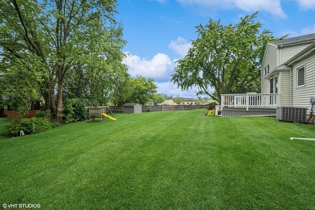 930 Bristol Trail Rd, Lake Zurich, IL 60047 - view of yard with a storage unit, a deck, and a playground