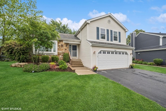 930 Bristol Trail Rd, Lake Zurich, IL 60047 - view of front of house with an attached garage, asphalt driveway, and a front lawn