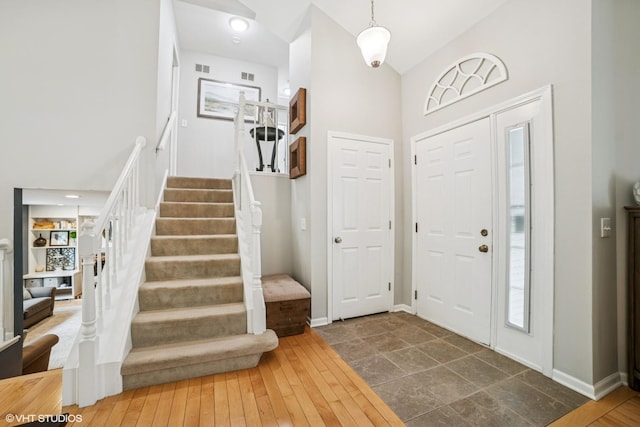 930 Bristol Trail Rd, Lake Zurich, IL 60047 - entryway with high vaulted ceiling and stairway