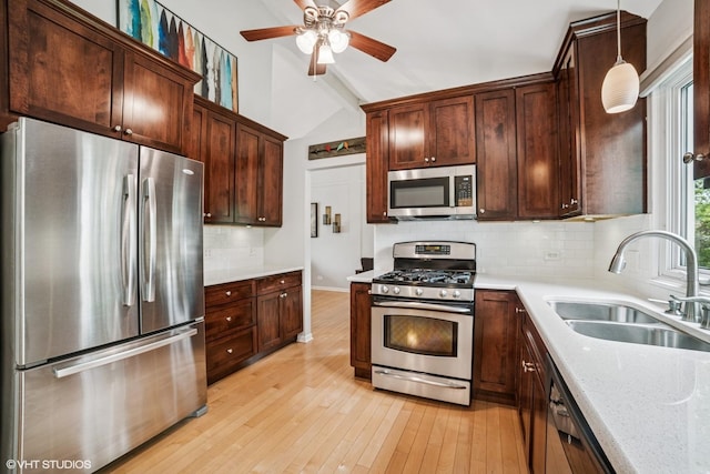 930 Bristol Trail Rd, Lake Zurich, IL 60047 - kitchen with appliances with stainless steel finishes, a ceiling fan, light wood-type flooring, lofted ceiling, and decorative backsplash