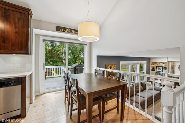 930 Bristol Trail Rd, Lake Zurich, IL 60047 - dining room featuring light wood finished floors and high vaulted ceiling
