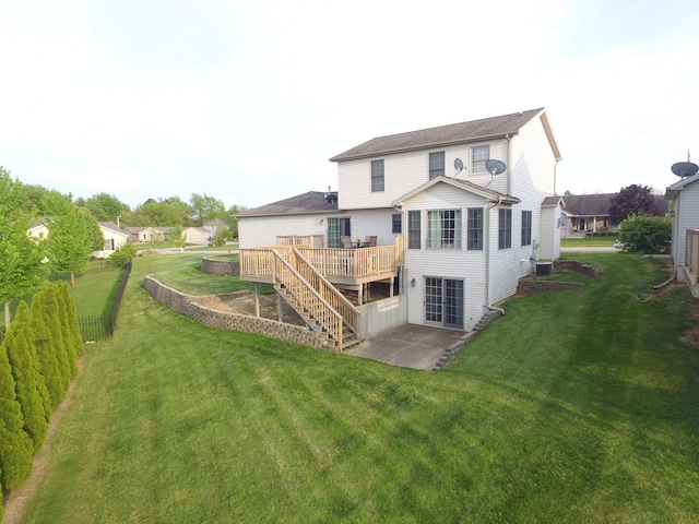 409 Boulder St, Heyworth, IL 61745 - rear view of house featuring a deck, a patio, and stairway