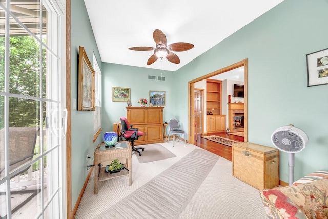20015 Founders Way, Olympia Fields, IL 60461 - home office with healthy amount of natural light, ceiling fan, and a fireplace