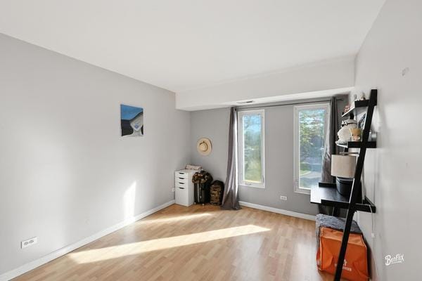 1425 Sandpebble Dr Unit 340, Wheeling, IL 60090 - misc room with wood finished floors and baseboards