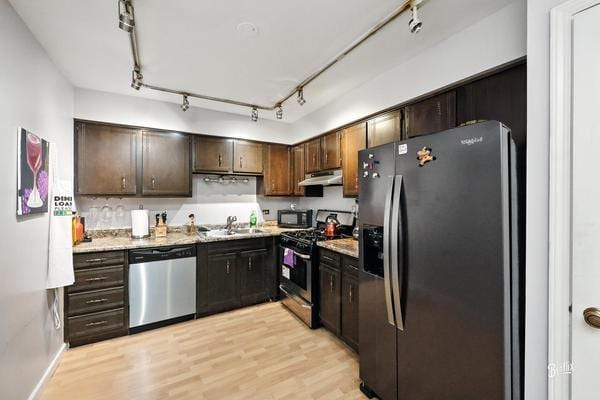 1425 Sandpebble Dr Unit 340, Wheeling, IL 60090 - kitchen featuring stainless steel appliances, under cabinet range hood, light wood finished floors, and dark brown cabinets