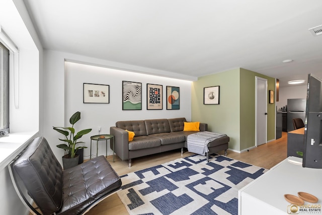 3632 S Winchester Ave, Chicago, IL 60609 - living area featuring baseboards and light wood-style floors