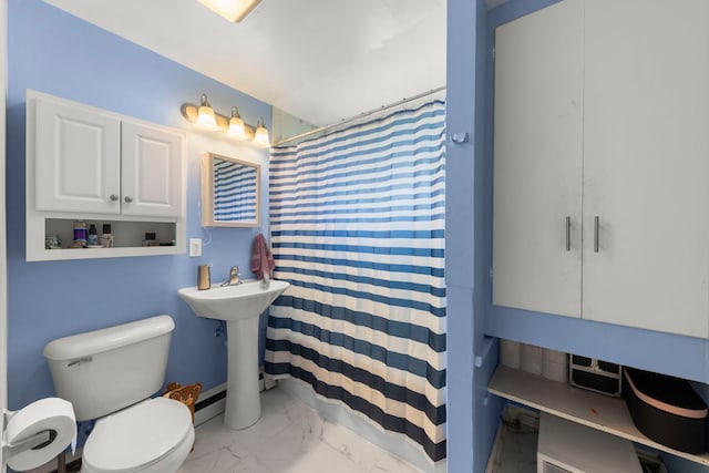 123 Tilton Park Dr, Dekalb, IL 60115 - full bathroom featuring marble finish flooring, curtained shower, and a baseboard heating unit