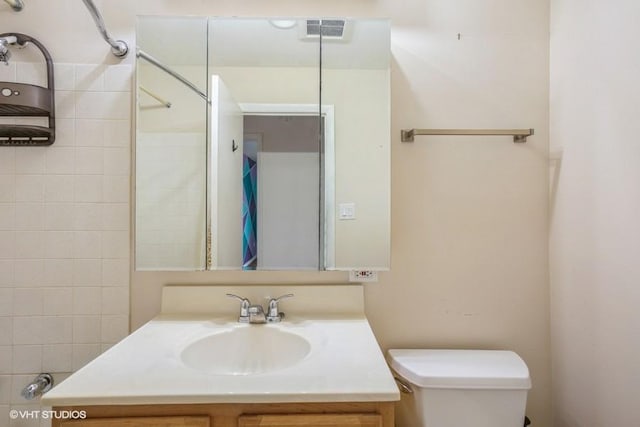 1205 E Hintz Rd Unit 206, Arlington Heights, IL 60004 - bathroom featuring toilet and vanity