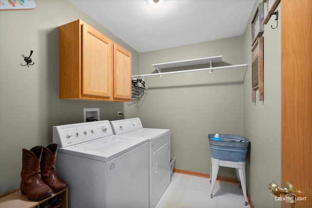 7512 Prairieside Dr, Plainfield, IL 60586 - laundry room featuring washer and clothes dryer, cabinet space, and light floors