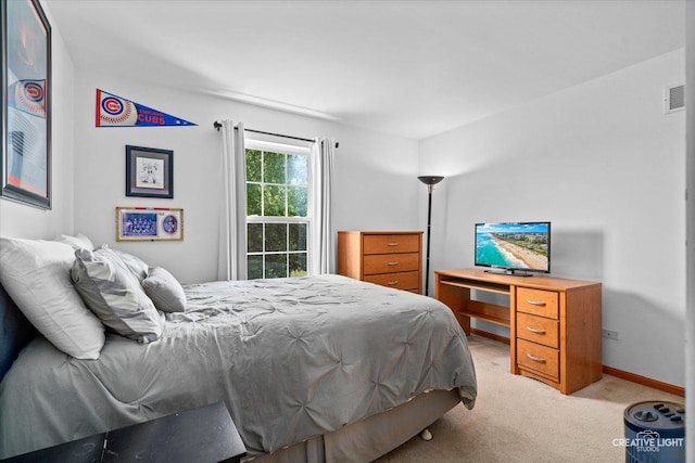 7512 Prairieside Dr, Plainfield, IL 60586 - bedroom with light carpet and baseboards
