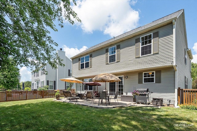7512 Prairieside Dr, Plainfield, IL 60586 - back of property featuring a fenced backyard and a patio