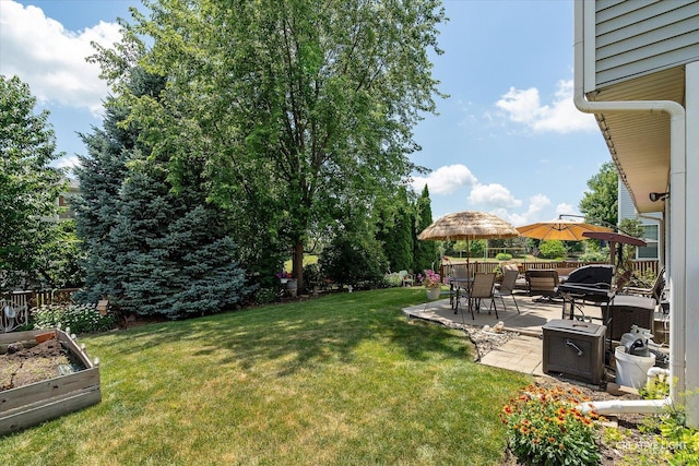 7512 Prairieside Dr, Plainfield, IL 60586 - view of yard featuring a vegetable garden and a patio area