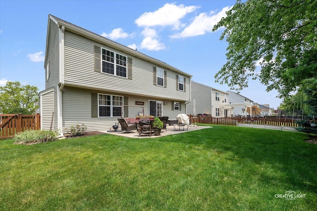 7512 Prairieside Dr, Plainfield, IL 60586 - back of property featuring a patio and a fenced backyard