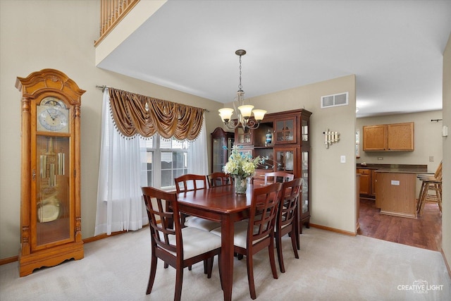7512 Prairieside Dr, Plainfield, IL 60586 - dining room with a chandelier and light carpet
