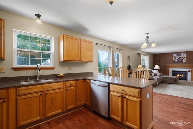 7512 Prairieside Dr, Plainfield, IL 60586 - kitchen featuring dishwasher, a peninsula, dark wood-style floors, and open floor plan