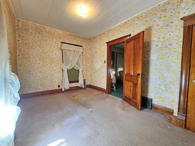 216 E Delaware St, Dwight, IL 60420 - carpeted spare room featuring wallpapered walls