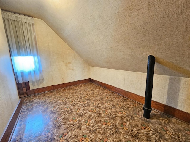 216 E Delaware St, Dwight, IL 60420 - additional living space featuring vaulted ceiling and carpet
