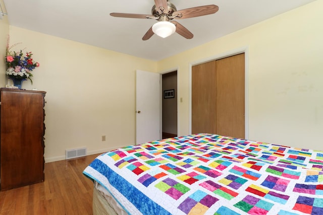 1001 Sheridan Rd, Normal, IL 61761 - bedroom featuring wood finished floors, ceiling fan, and a closet