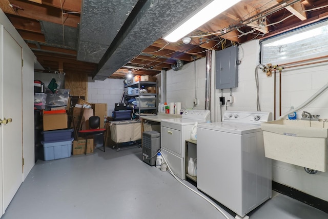 1001 Sheridan Rd, Normal, IL 61761 - unfinished basement with electric panel, washer and clothes dryer, and concrete block wall