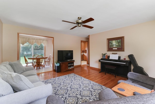 1001 Sheridan Rd, Normal, IL 61761 - living room featuring a ceiling fan and wood finished floors