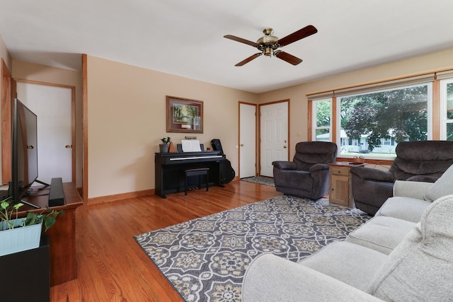 1001 Sheridan Rd, Normal, IL 61761 - living room with light wood finished floors and ceiling fan