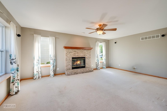 1884 Shore Line Ct, Romeoville, IL 60446 - unfurnished living room featuring a ceiling fan, carpet flooring, and a fireplace