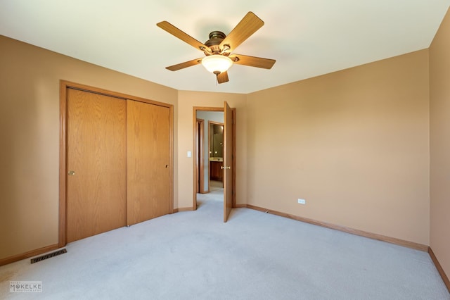 1884 Shore Line Ct, Romeoville, IL 60446 - unfurnished bedroom featuring light colored carpet, a closet, and ceiling fan