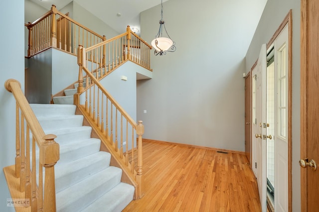 1884 Shore Line Ct, Romeoville, IL 60446 - entryway featuring wood finished floors, stairway, and a high ceiling