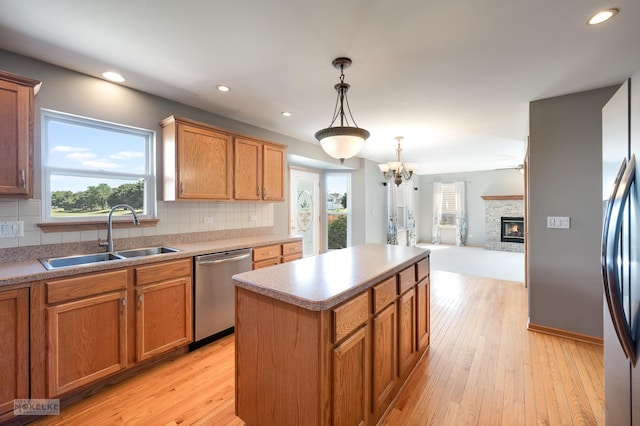 1884 Shore Line Ct, Romeoville, IL 60446 - kitchen with stainless steel appliances, a kitchen island, backsplash, healthy amount of natural light, and recessed lighting