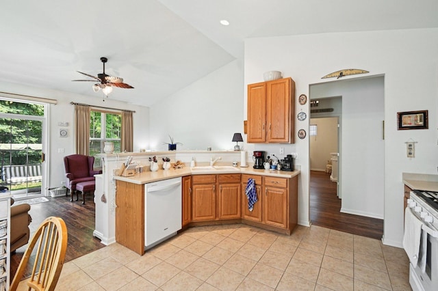 13120 Birmingham Ct, Beach Park, IL 60083 - kitchen featuring white appliances, vaulted ceiling, light countertops, a peninsula, and ceiling fan