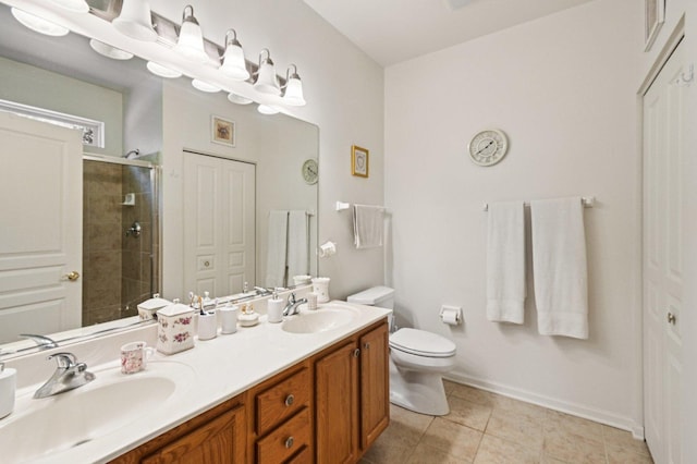 13120 Birmingham Ct, Beach Park, IL 60083 - bathroom featuring a stall shower, double vanity, and tile patterned floors