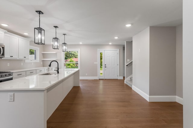 1205 Broadmoor Dr, Champaign, IL 61821 - kitchen with appliances with stainless steel finishes, light countertops, recessed lighting, white cabinetry, and dark wood-style floors
