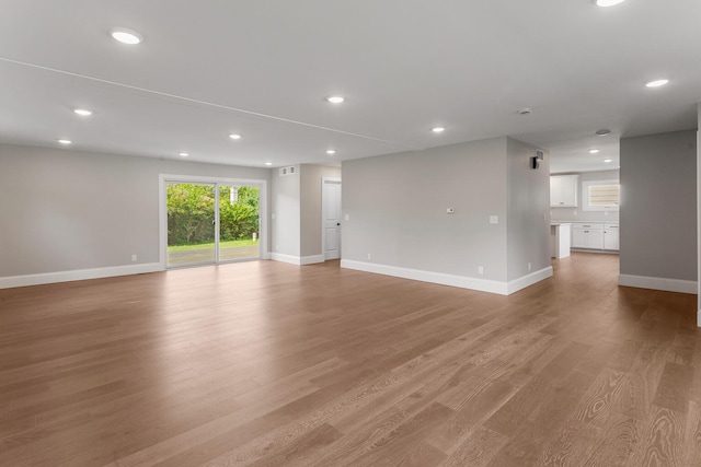1205 Broadmoor Dr, Champaign, IL 61821 - unfurnished room with light wood-style floors and recessed lighting