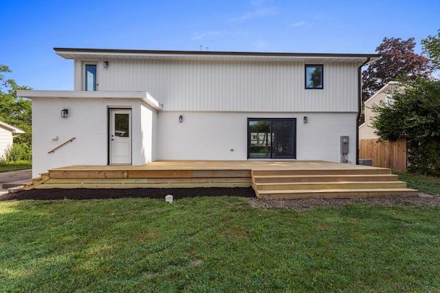 1205 Broadmoor Dr, Champaign, IL 61821 - back of property with a wooden deck and brick siding