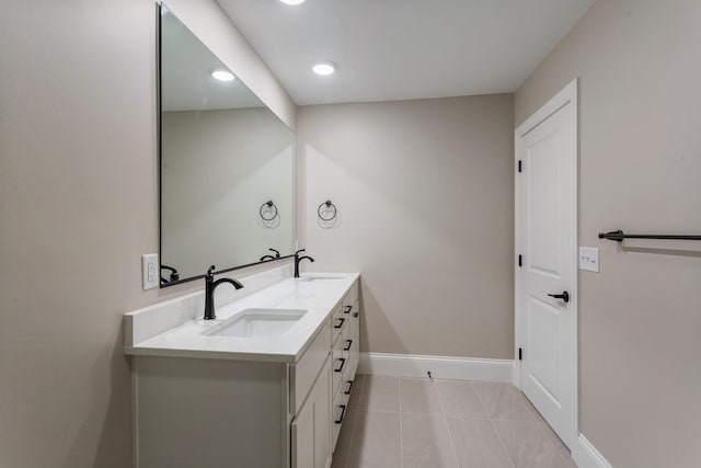 1205 Broadmoor Dr, Champaign, IL 61821 - bathroom featuring double vanity, tile patterned floors, and recessed lighting