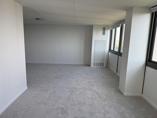4850 S Lake Park Ave Unit 1508, Chicago, IL 60615 - carpeted spare room featuring baseboards