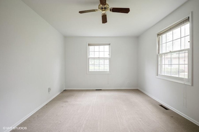 1220 Park Ave W Unit 110, Highland Park, IL 60035 - spare room featuring light carpet and ceiling fan