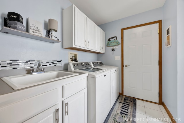 2436 Haider Ave, Naperville, IL 60564 - laundry area with washer and clothes dryer, cabinet space, and light tile patterned floors
